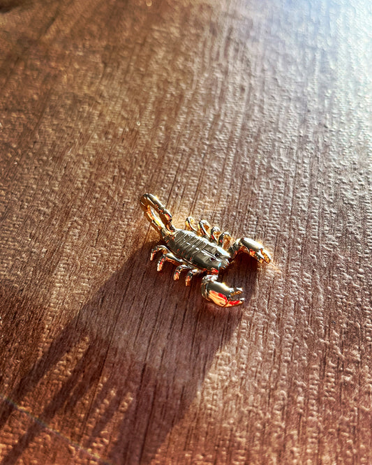 Gold scorpion pendant
