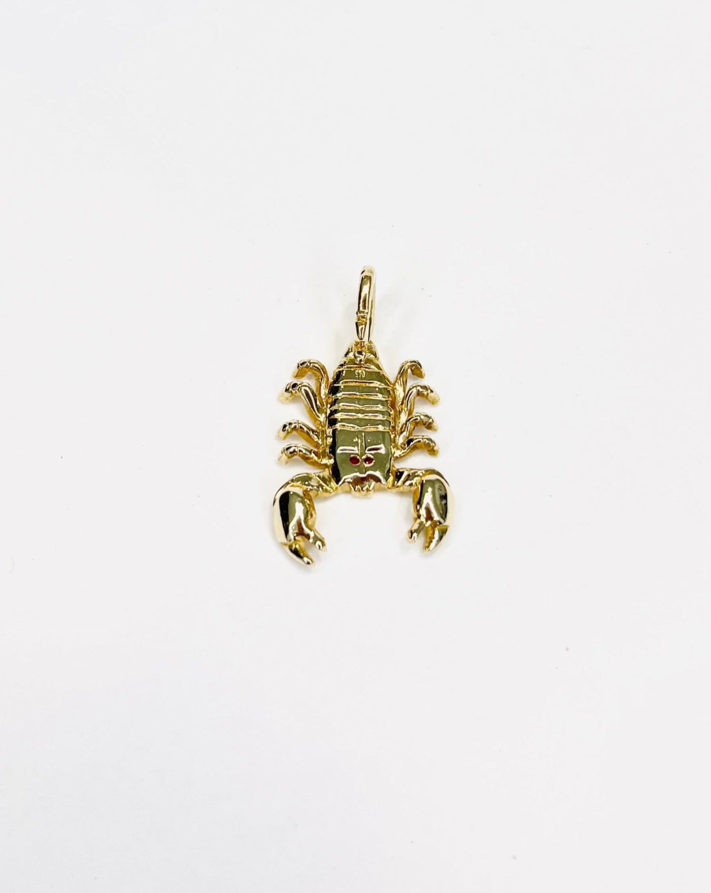 Gold scorpion pendant